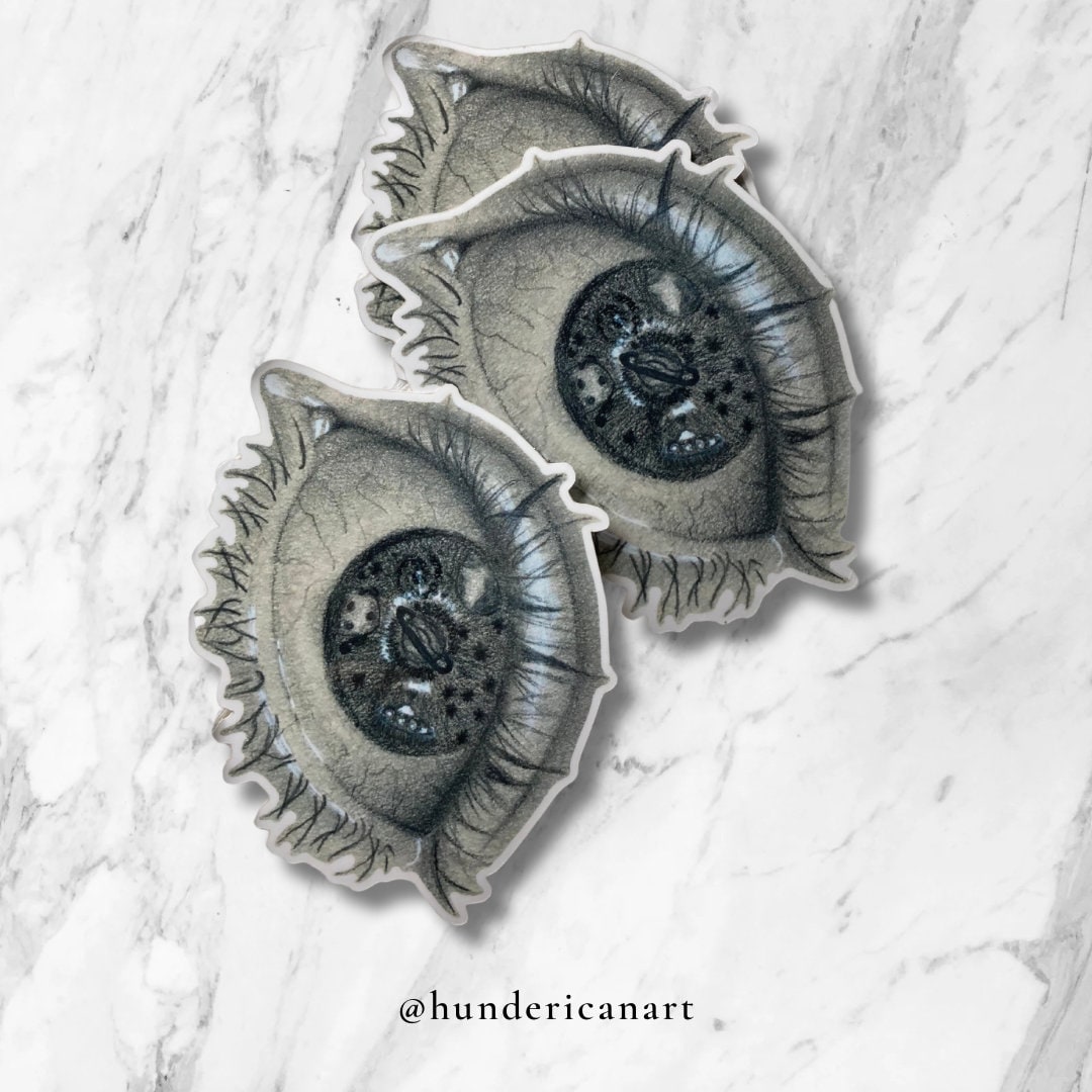 Planetary Eye Sticker | Cosmic Gaze: Black and White Eye Sticker with Glittering Galaxy Accents